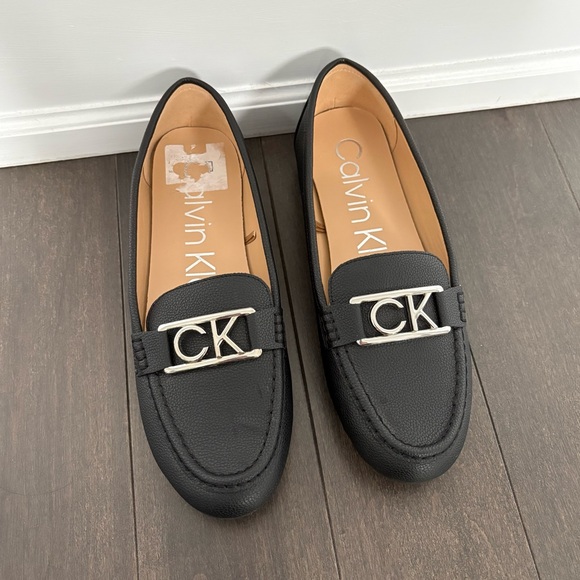 Calvin Klein Shoes - Brand New Women’s Calvin Klein Loafers Black Size 8.5 leather Silver logo